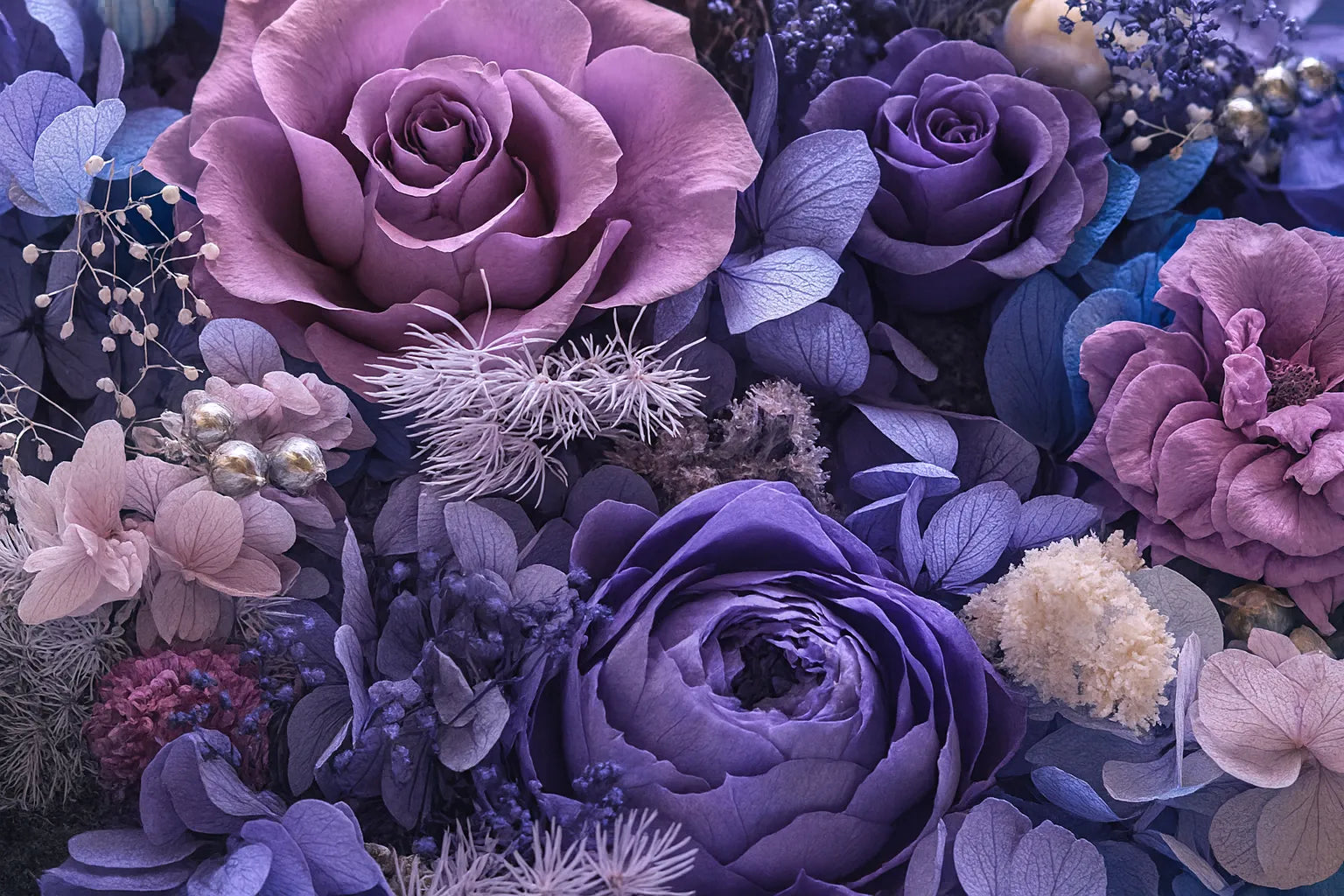 Close-up of a bouquet of purple and pink flowers