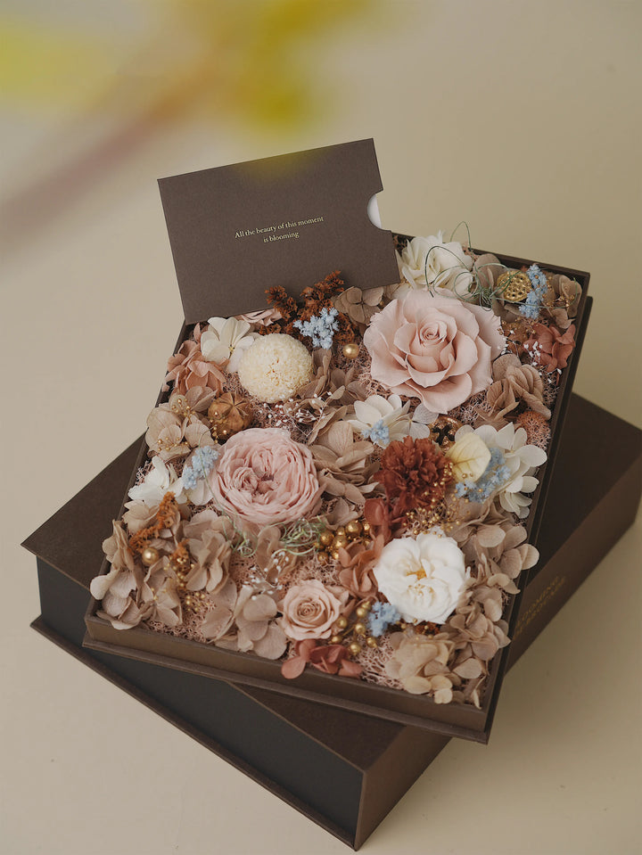 Everlasting Flora Book with preserved flowers in mocha, beige, and caramel tones