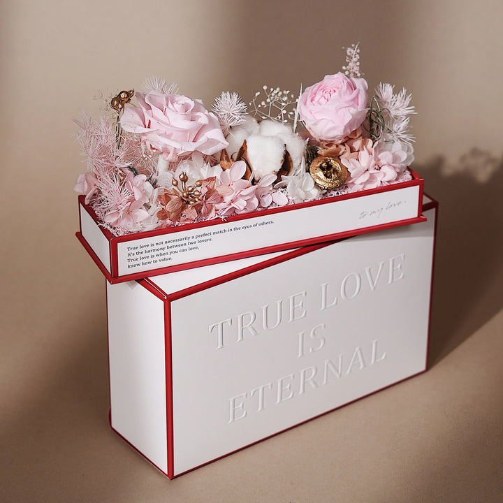 Pink preserved flower arrangement without the acrylic cover from the Everlasting Flora Envelope
