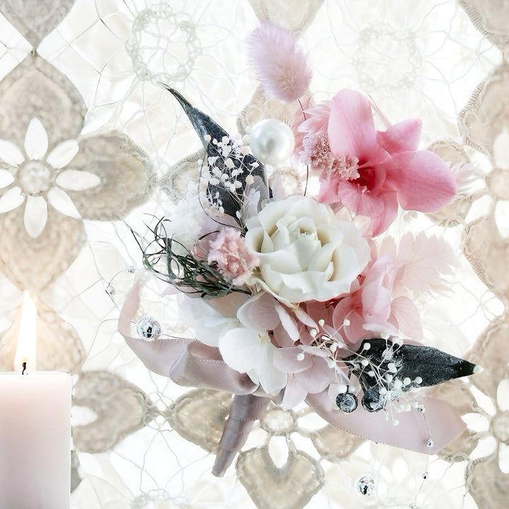 Elegant preserved boutonniere with white rose, pink orchid, pearl and hydrangea, styled for weddings