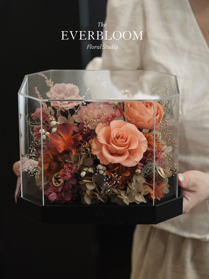 Person holding octagon preserved flower box in Autumn Ember Taupe & Orange