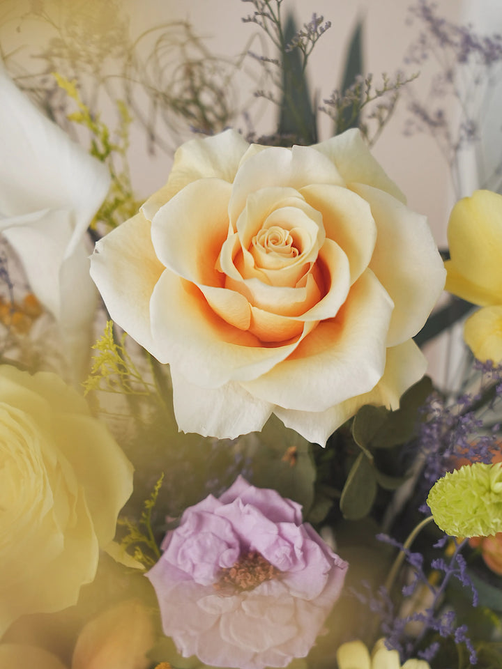 Close-up of preserved flowers in Roman Apricot White & Yellow