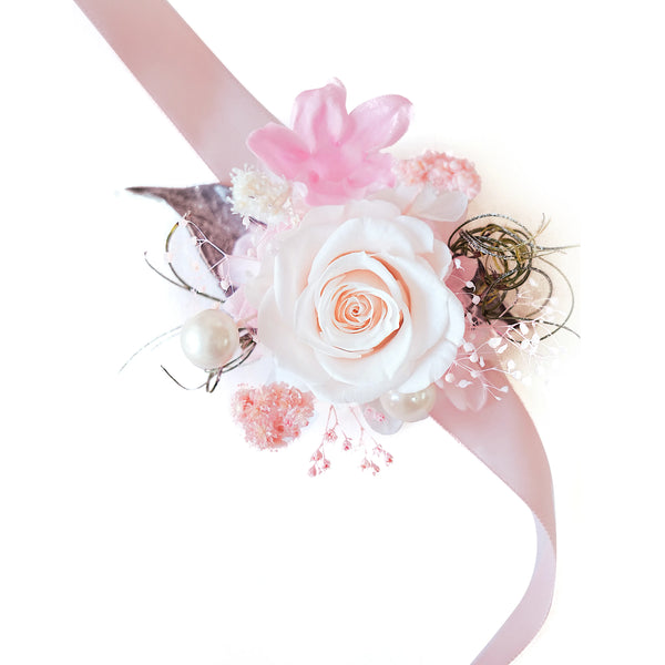 Elegant preserved flower wrist corsage with white rose and pink orchid for weddings