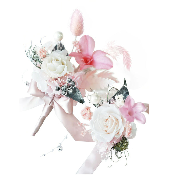 Bridal and groom preserved flower accessories set featuring white roses and pink orchids